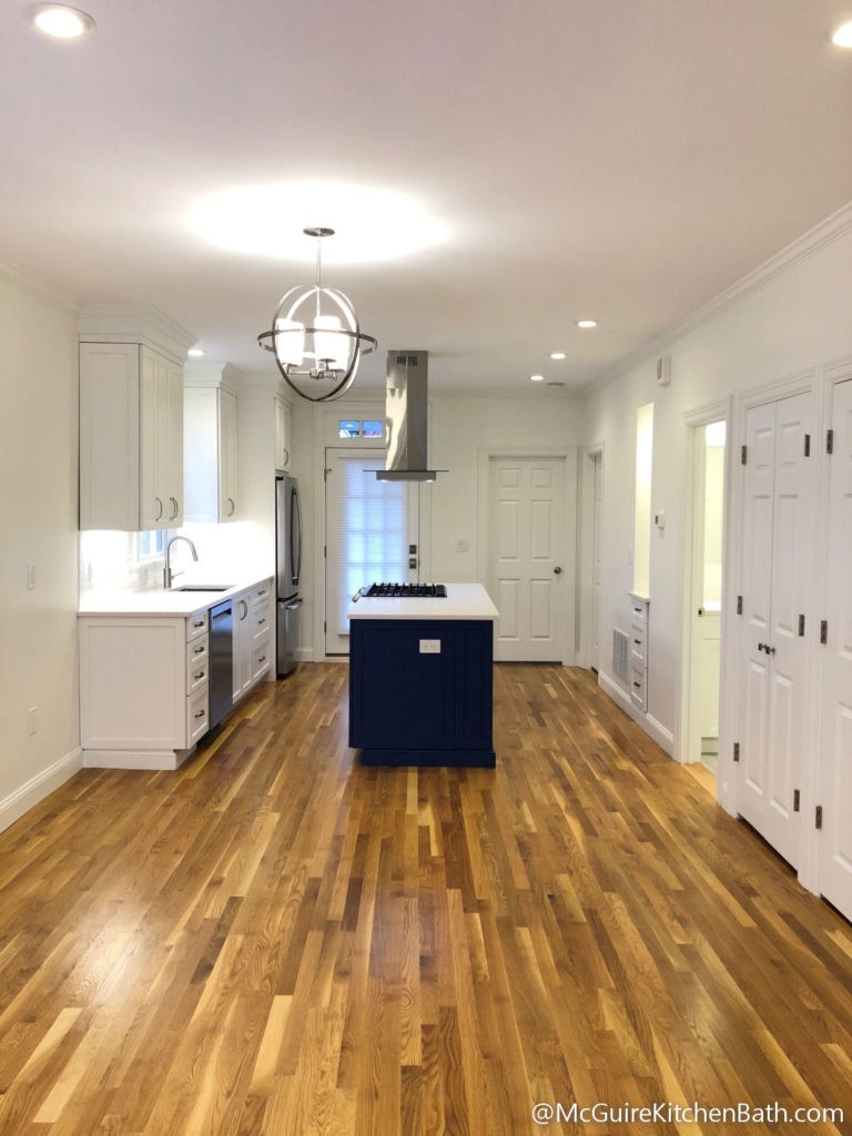 Cambridge Condo Remodel - White Kitchen Cabinets with Blue Island