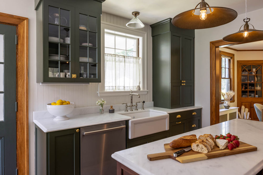 Melrose Kitchen Design with olive green cabinets and a walnut island