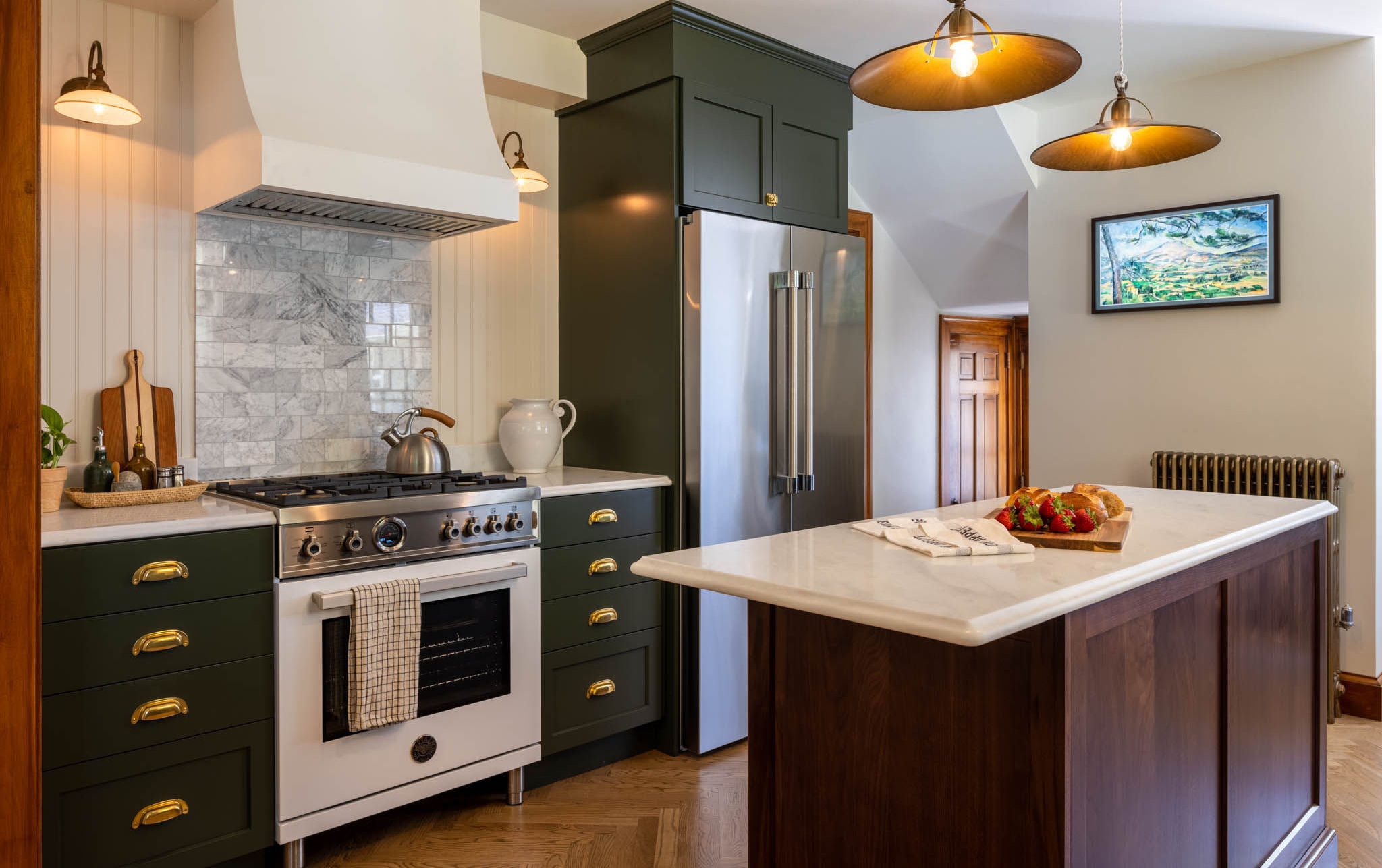 Melrose Kitchen Design with olive green cabinets and a walnut island