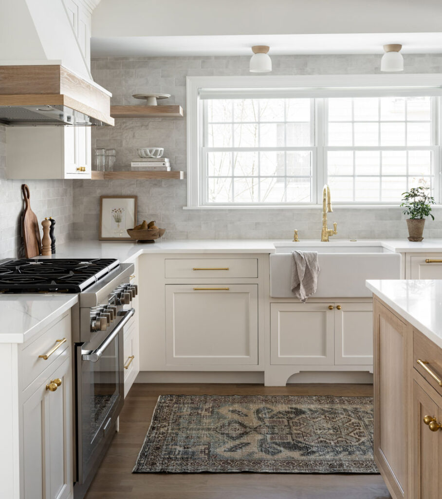 Winchester Kitchen Design with white cabinetry and gold hardware