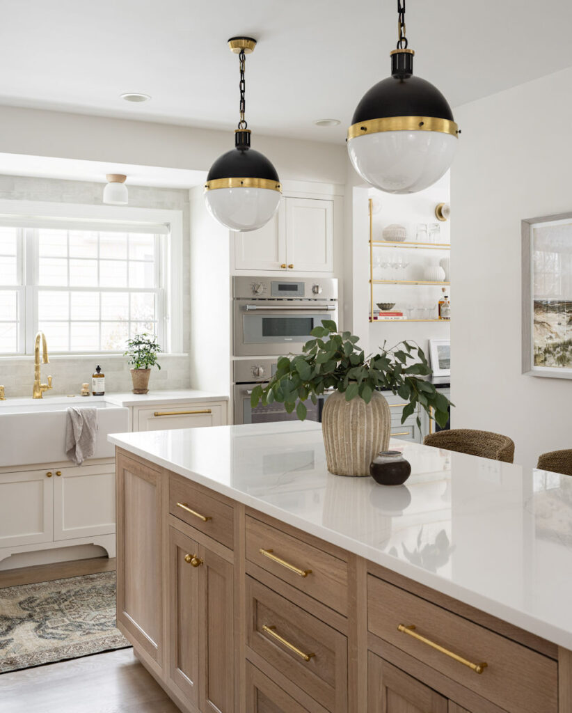 Winchester Kitchen Design with quarter sawn oak cabinets and gold hardware