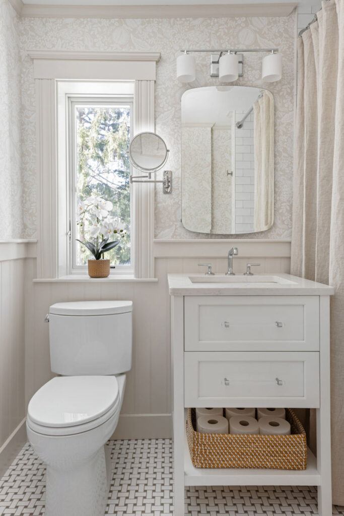 Malden Bathroom Design and Remodel with white vanity and basketweave tile floor