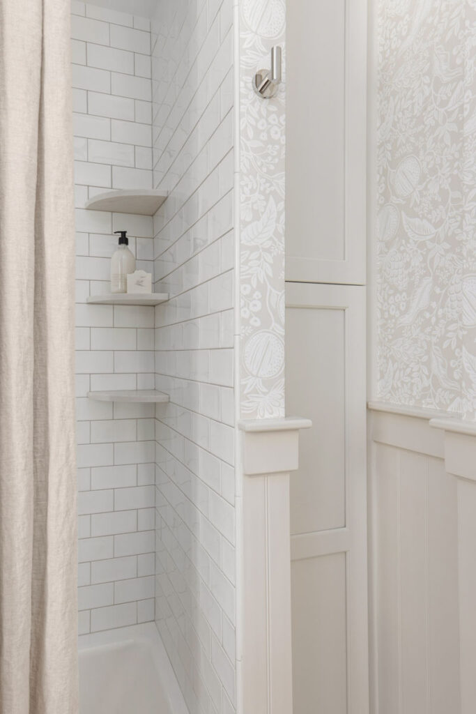 Malden Bathroom Design and Remodel with white subway tiles and Rifle Paper Co Second Edition Wallpaper Pomegranate