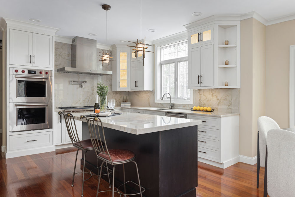 Windham kitchen with white cabinets, an onyx cherry island, and quartz countertops
