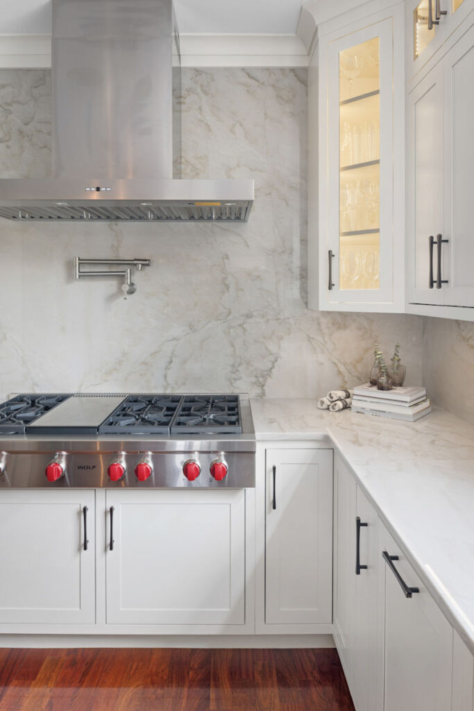 Windham kitchen remodel with white cabinets and Wolf range top