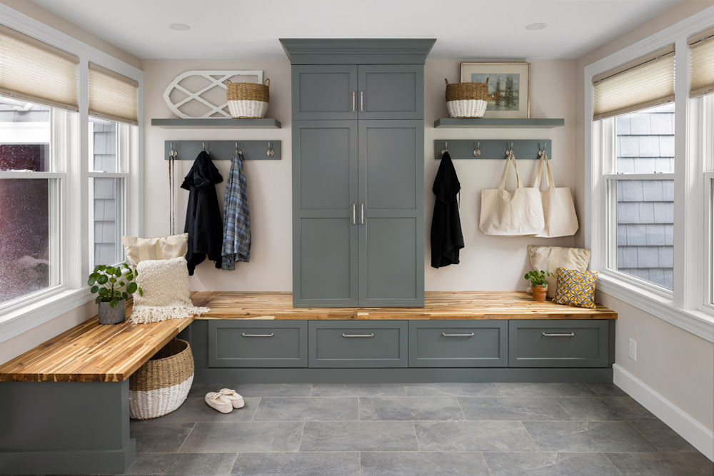 Stoneham home remodeling project mudroom remodel with gray green cabinetry
