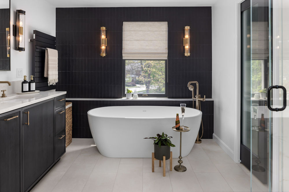 Luxury Bathroom Remodel in Stoneham with reeded cabinetry and soaking tub