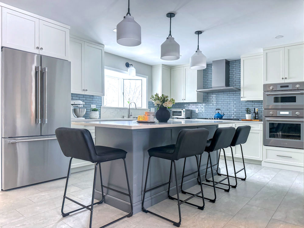 Wakefield kitchen remodel with white cabinets and gray island - McGuire + Co Kitchen & Bath - Design Build in Wakefield MA