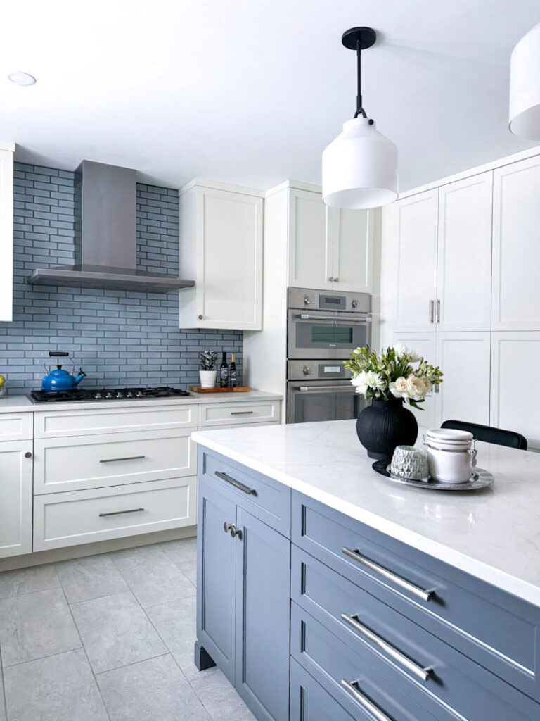 Wakefield kitchen remodel with white cabinetry and blue gray island - McGuire + Co Kitchen & Bath - Wakefield MA