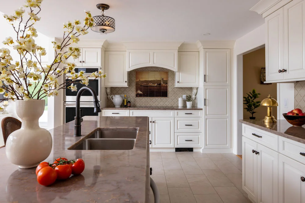 Kitchen design-build remodel in Stoneham MA with cream cabinets and quartz countertop