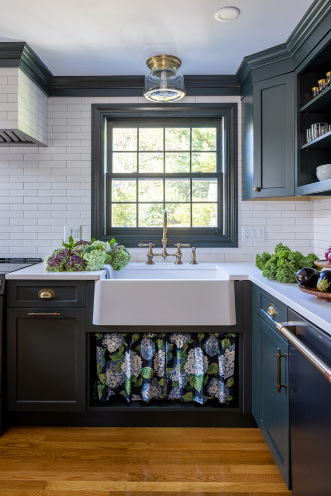 Wakefield kitchen remodel with green cabinetry and apron sink with fabric skirt curtain