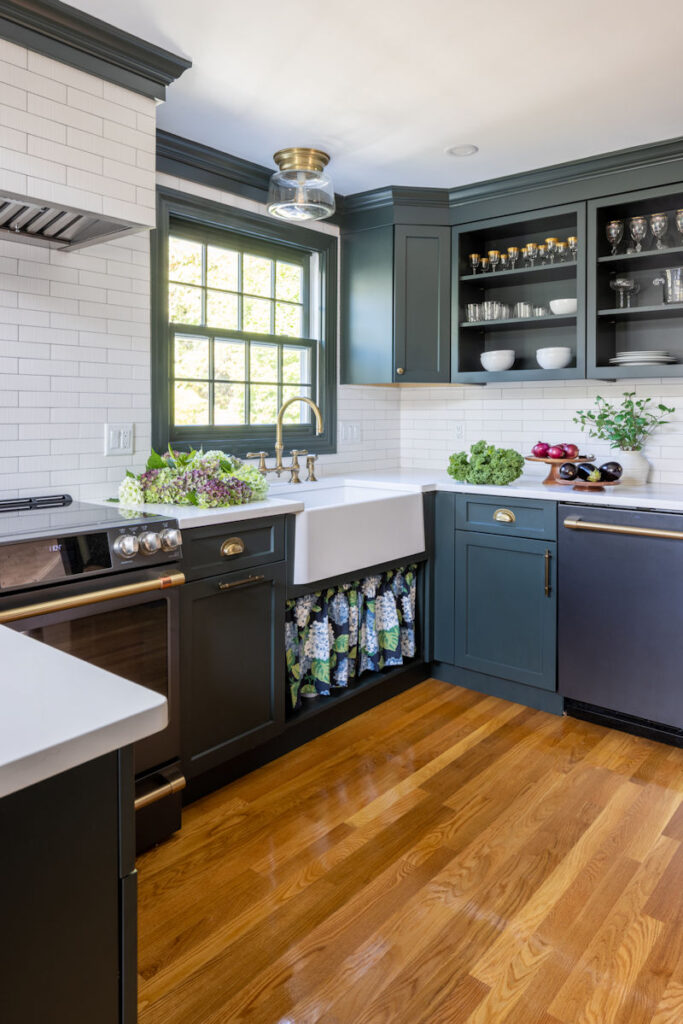 Wakefield kitchen remodel with green cabinetry open shelving and apron sink