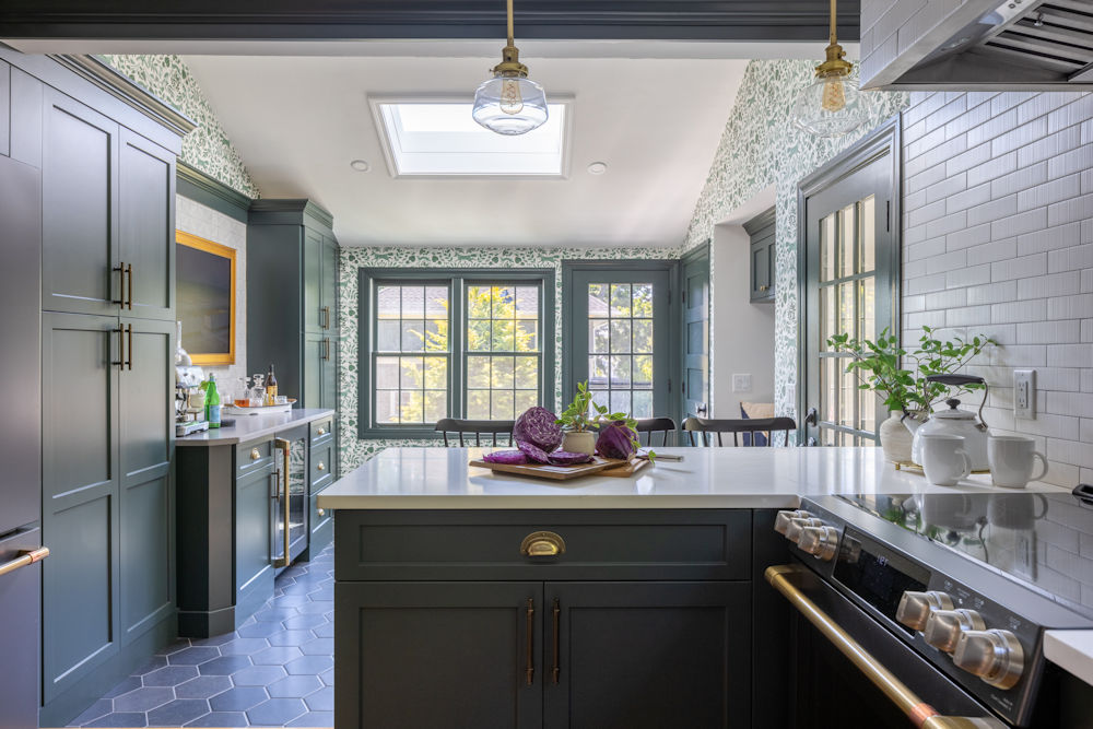 Wakefield kitchen remodel with green cabinetry and white textured subway tile backsplash and bar area