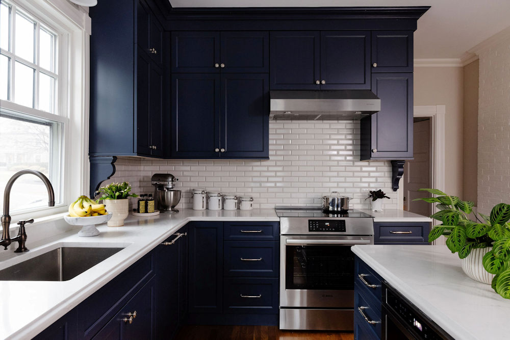 Wakefield victorian kitchen remodel design build project with navy blue cabinetry and white subway tile backsplash