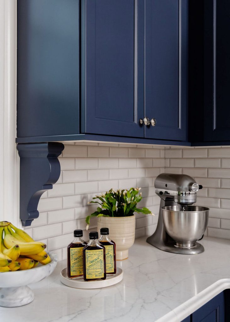 Wakefield victorian kitchen remodel design build project with navy blue cabinetry and white subway tile backsplash