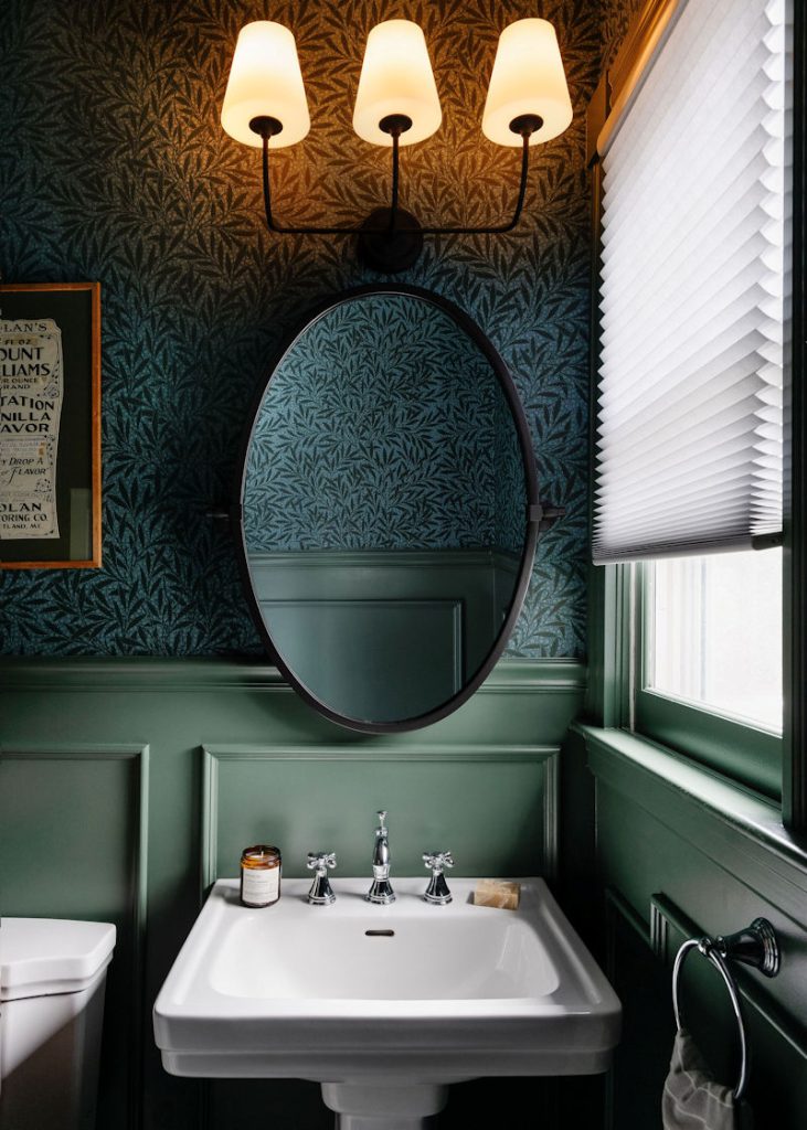 Wakefield victorian powder room remodel design build project with a pedestal sink and green wallpaper
