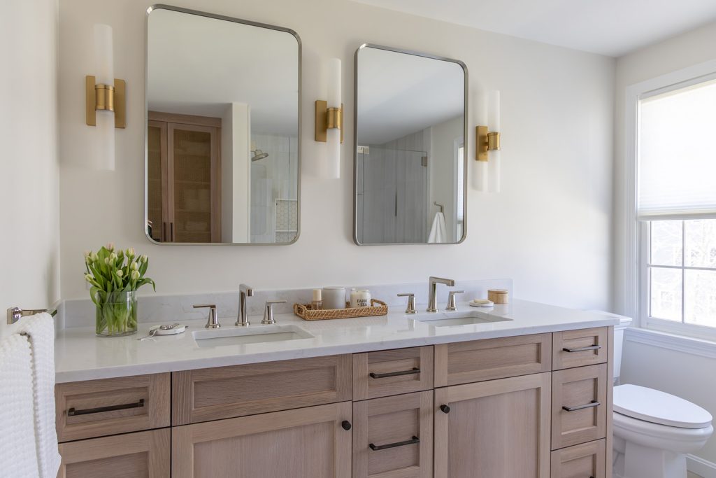 Primary bathroom design and remodeling project with a double sink white oak vanity