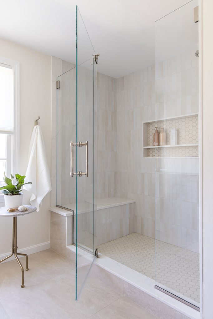 Primary bathroom design and remodeling project custom shower with soft neutral tile