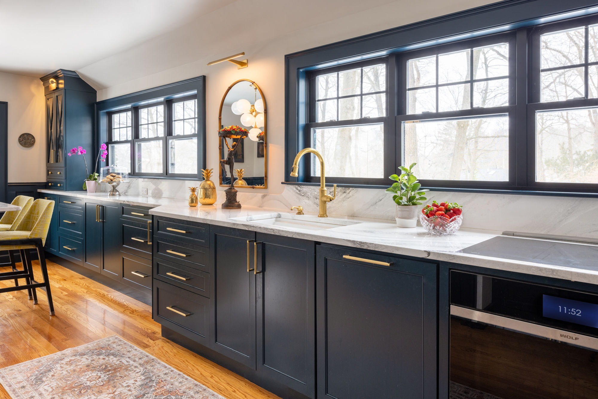 Melrose kitchen design-build remodel with deep blue cabinety and quartz countertop