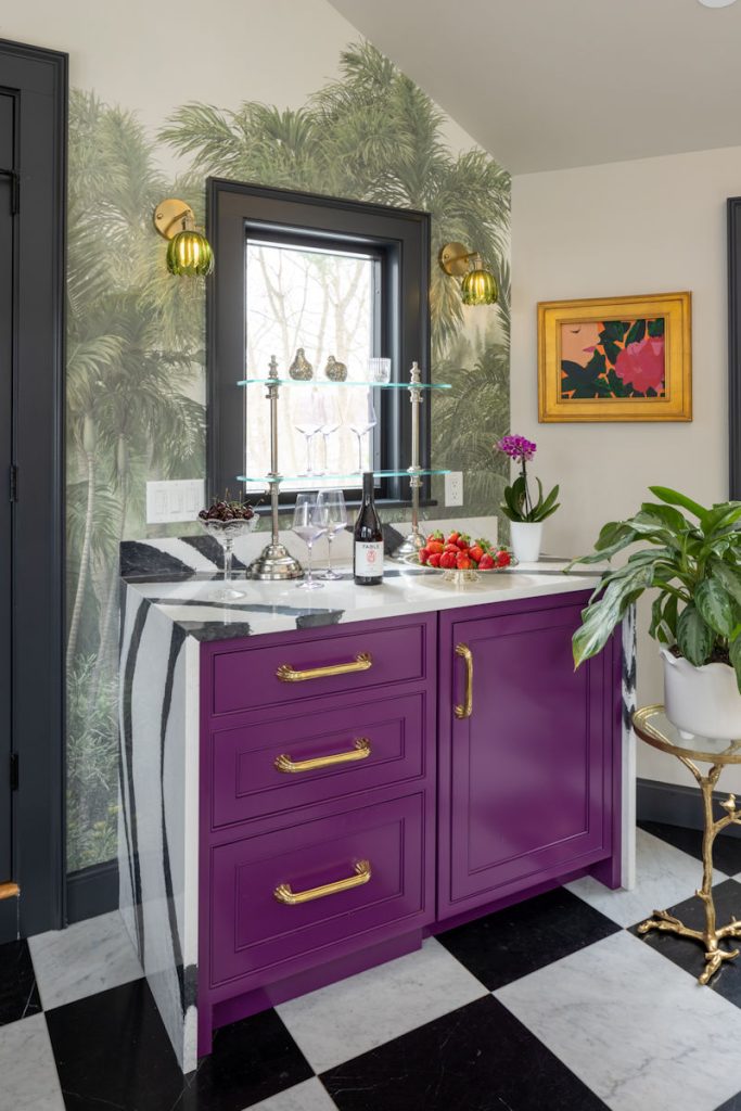 Melrose design-build project with salon breezeway raspberry cabinetry with bold black and white quartz countertop.
