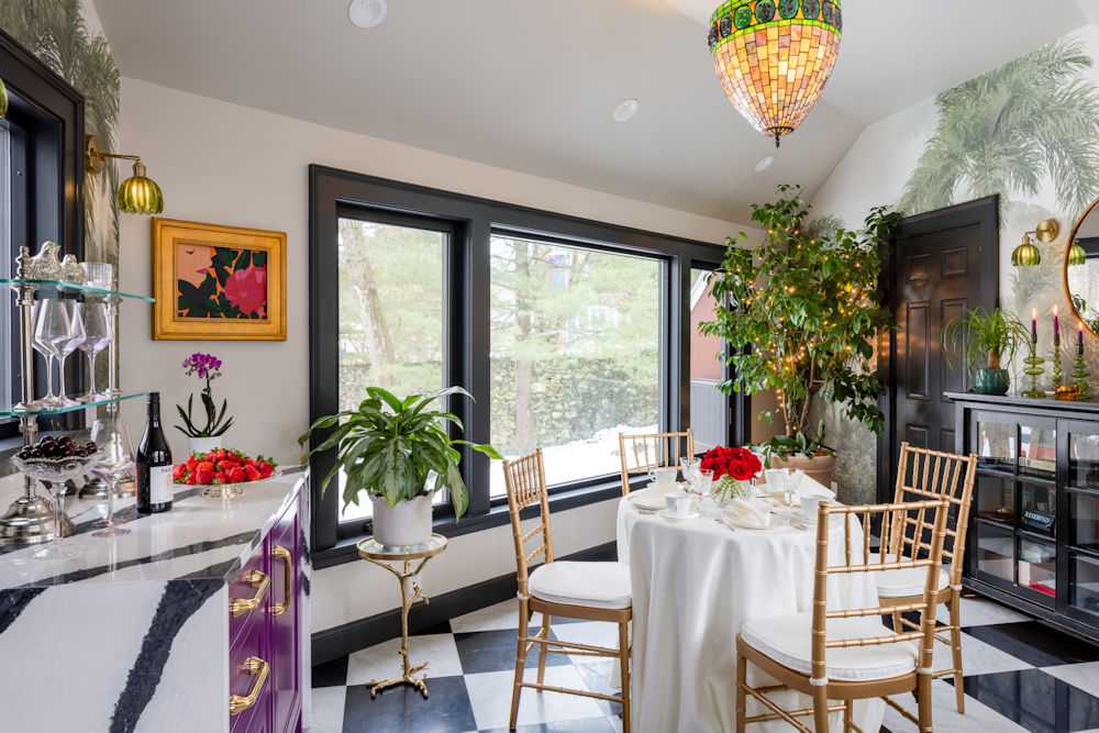 Melrose design-build project with salon breezeway raspberry cabinetry with bold black and white quartz countertop.