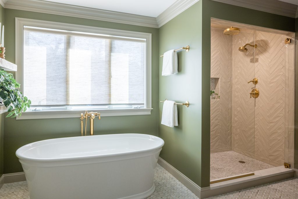 Winchester Primary Bathroom Remodel with luxury soaking tub and custom shower, gold fixtures and hardware, and Benjamin Moore Springfield Sage wall paint